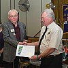 PID Art Woods presenting a Presidential Certificate of Appreciaton to Lion Brian Cunningham