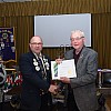 PID Art Woods presenting a Presidential Certificate of Appreciaton to Lion Mark Koenig